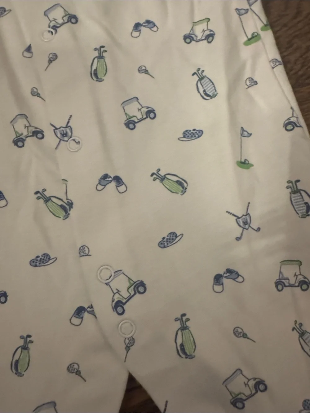 Kissy Kissy golf onesie